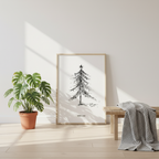 Minimalistischer Weihnachtsbaum als gerahmtes Poster in einem hellen Wohnraum mit Pflanze